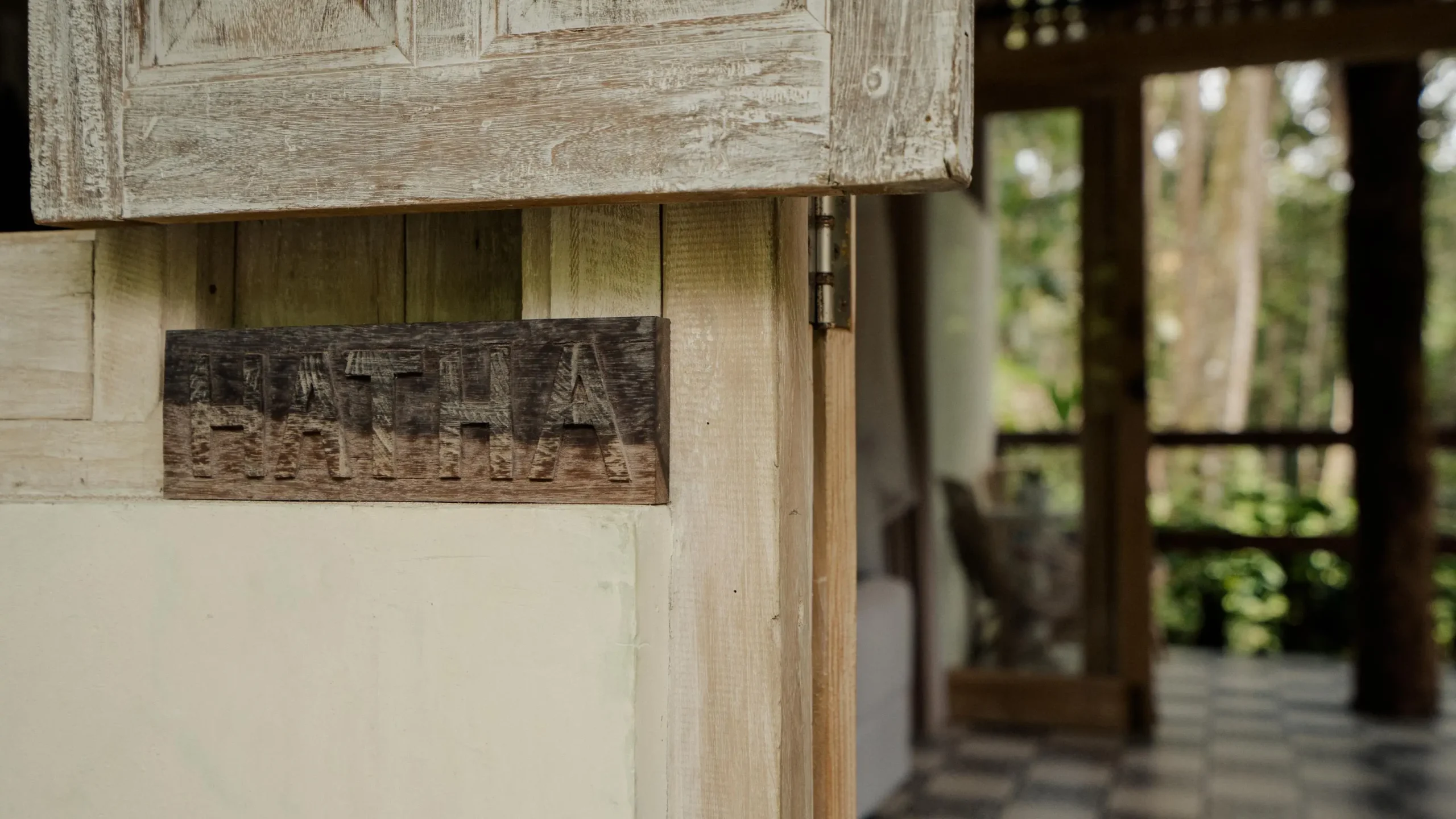 wooden door labeled with "Personal Retreat" sign