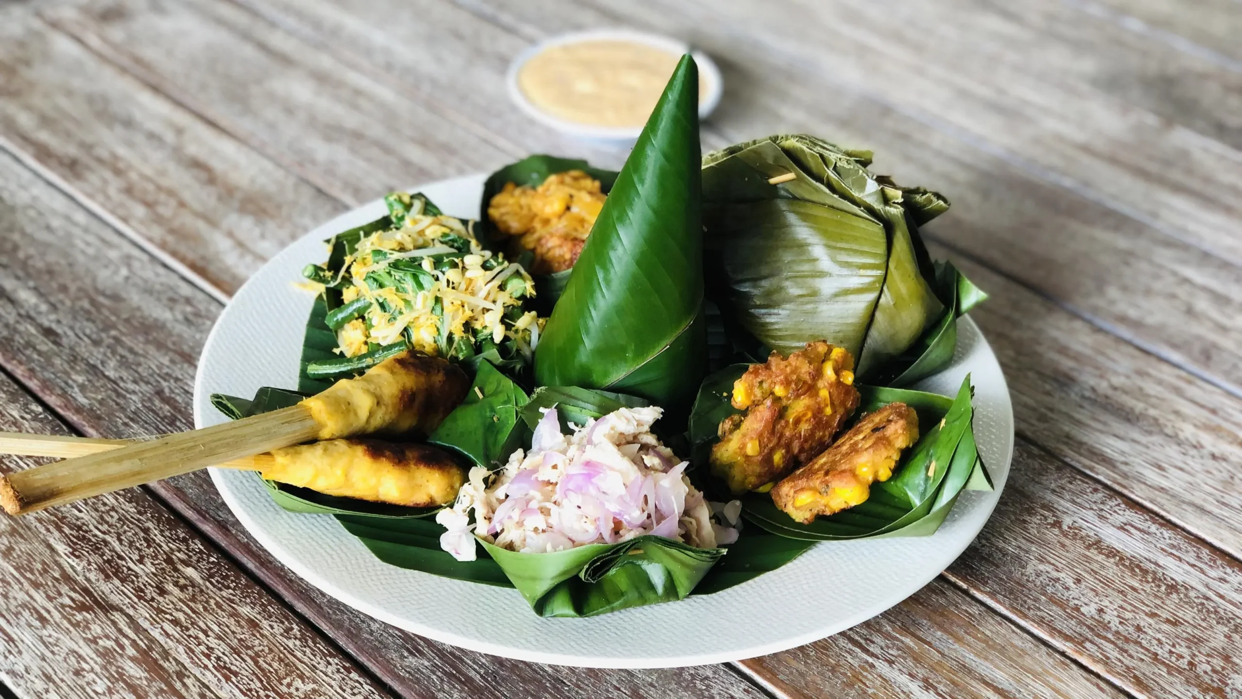 Sustainable retreat menu planning: plant-based dish on rustic table