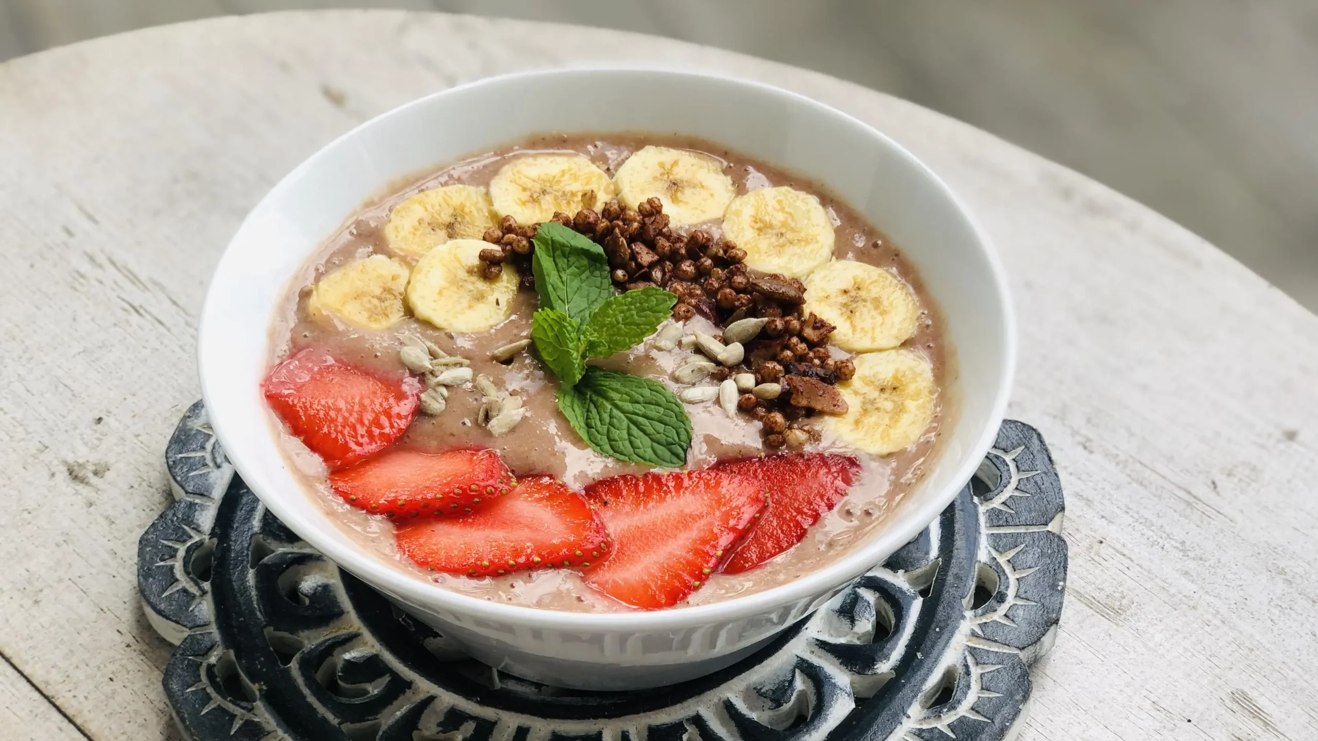 Bowl with banana, strawberries at aligning health retreat