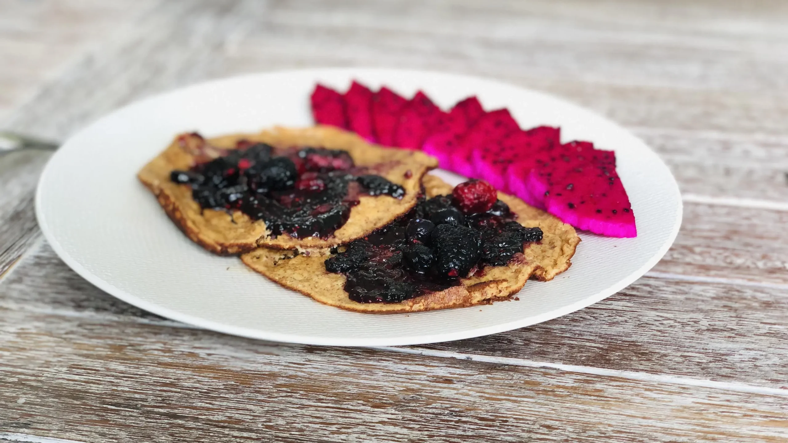 Gourmet dish with floral garnish, highlighting retreat program details.