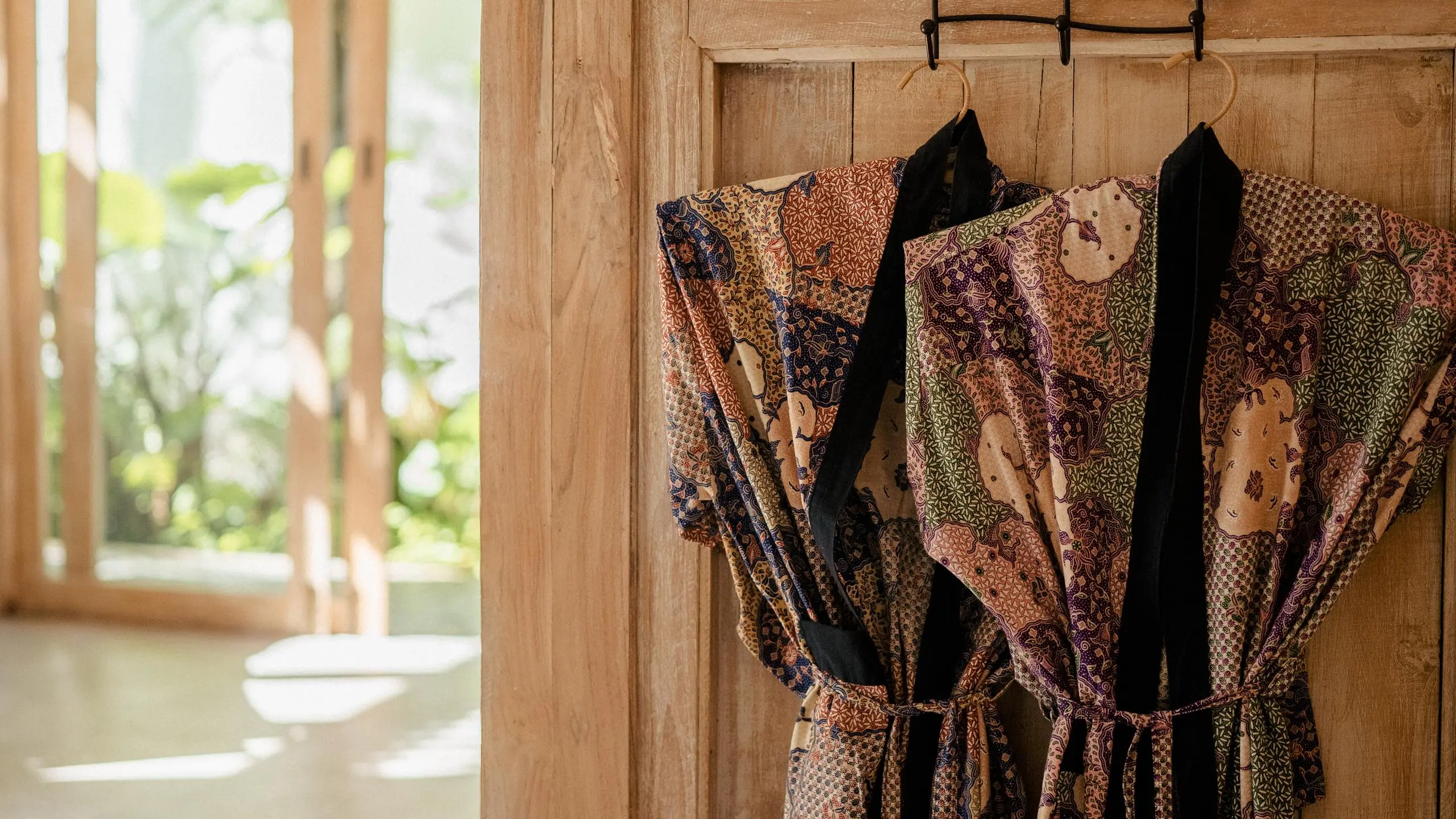 Wooden door with tie symbolizes entry to a meditation retreat, illustrating what happens at a meditation retreat.
