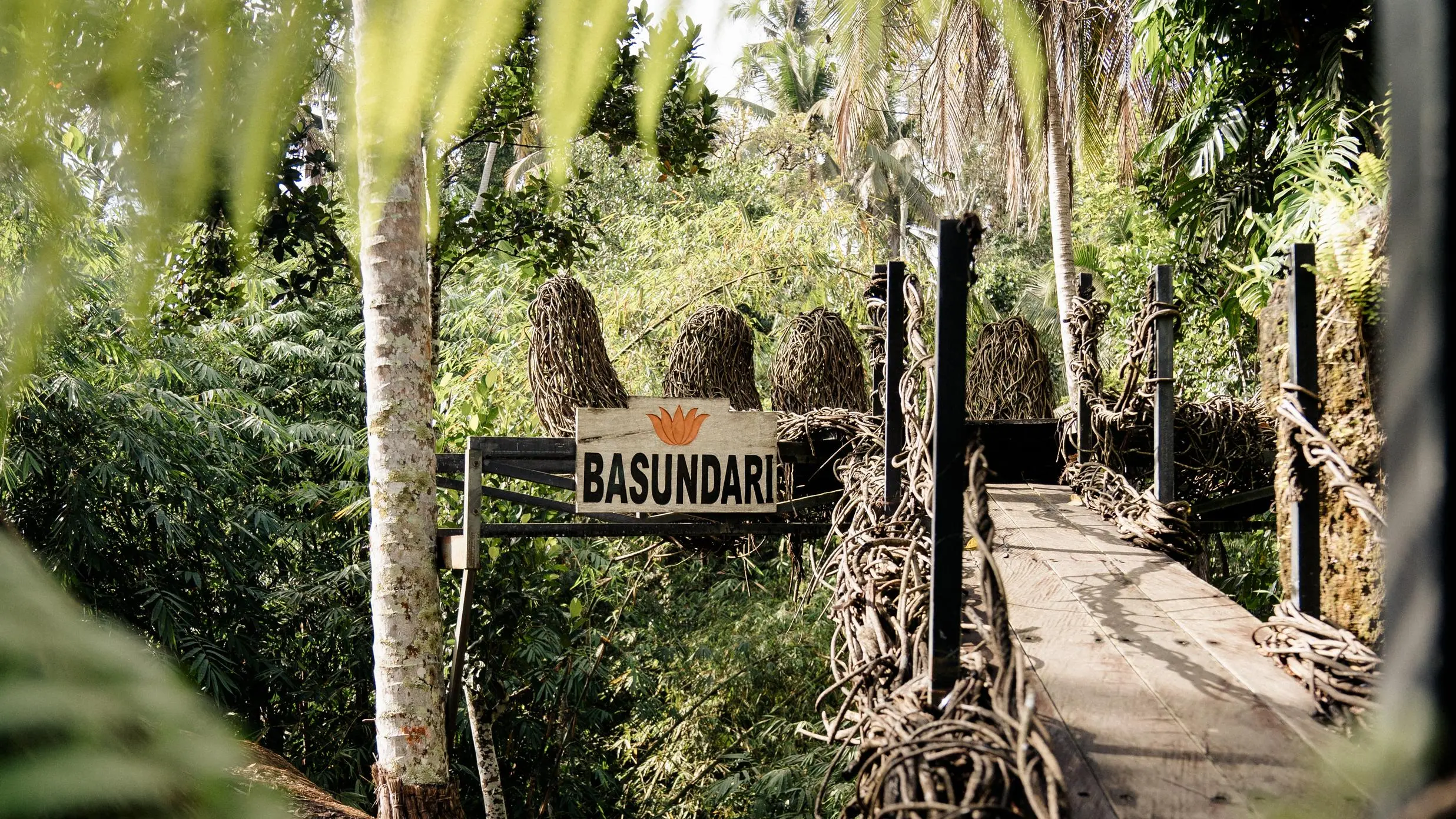 Team brainstorming session on a wooden bridge, representing creative retreat agenda ideas