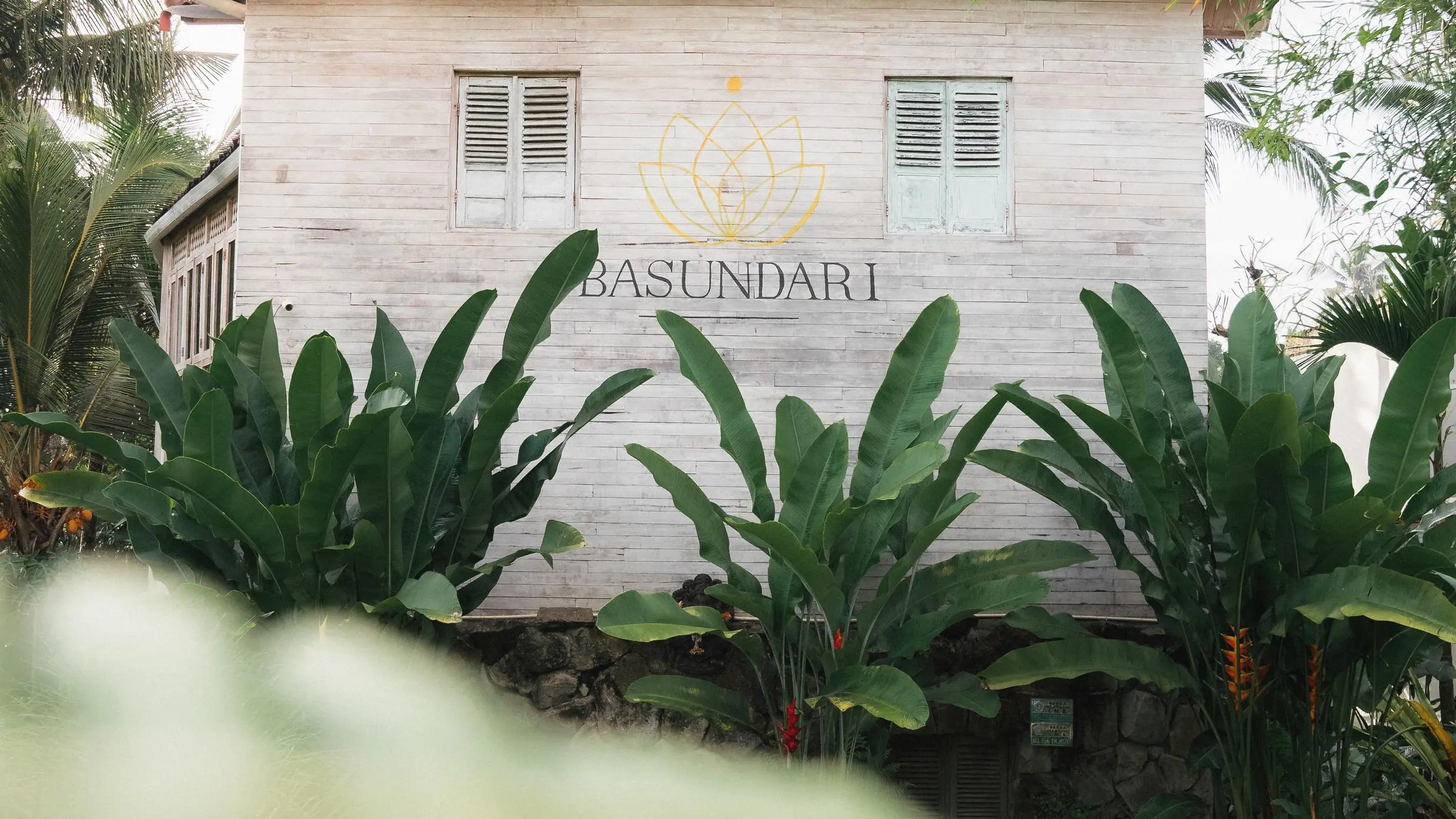 Asura villa surrounded by lush greenery at a Bali wellness retreat