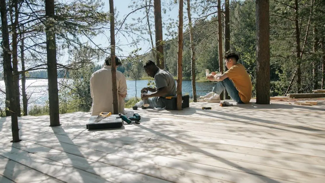 Workers enjoying a lunch break in nature, illustrating evidence based wellness in the workplace.