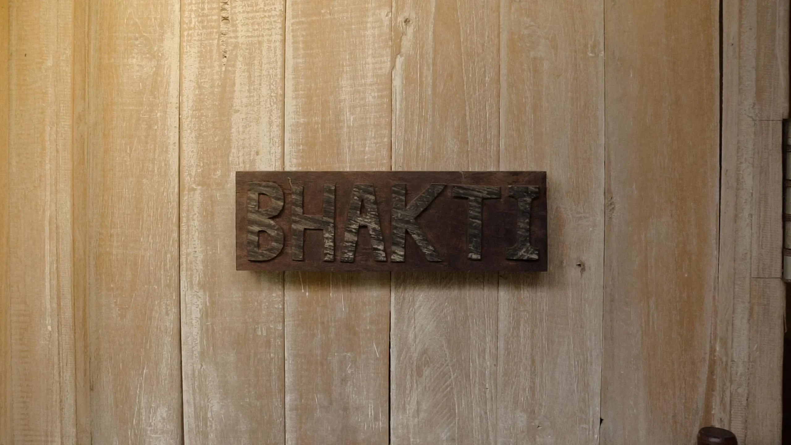 Calming wooden door with yoga for depression class sign, inviting space for mental well-being