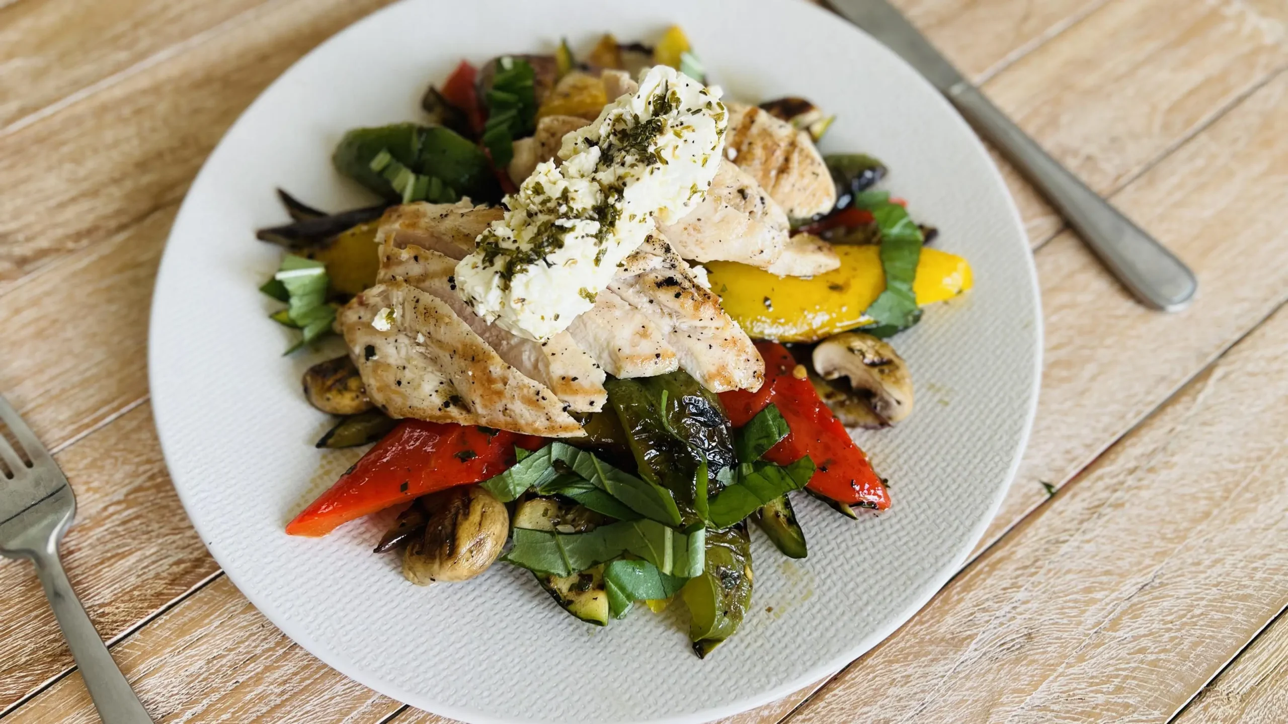 Tranquil Ubud yoga retreat center surrounded by lush greenery and traditional Balinese architecture